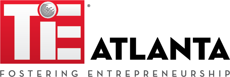 Red “TiE” logo with a dotted speech-bubble circle above the “I.”